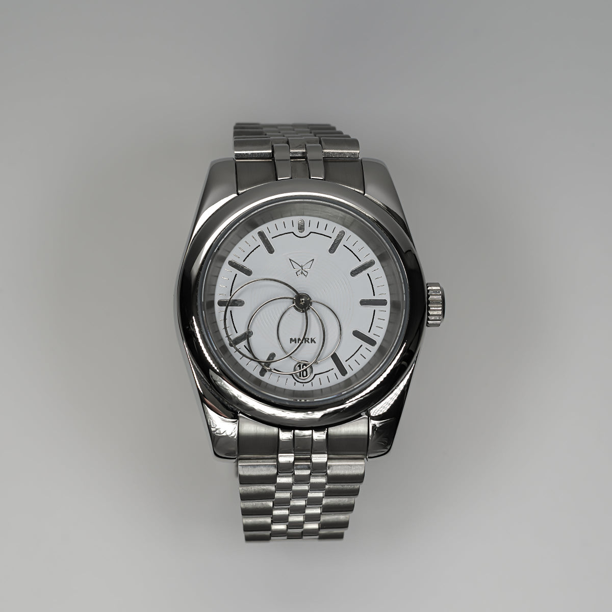 Luxury silver watch, with a white dial and circular hands, viewed from the front.